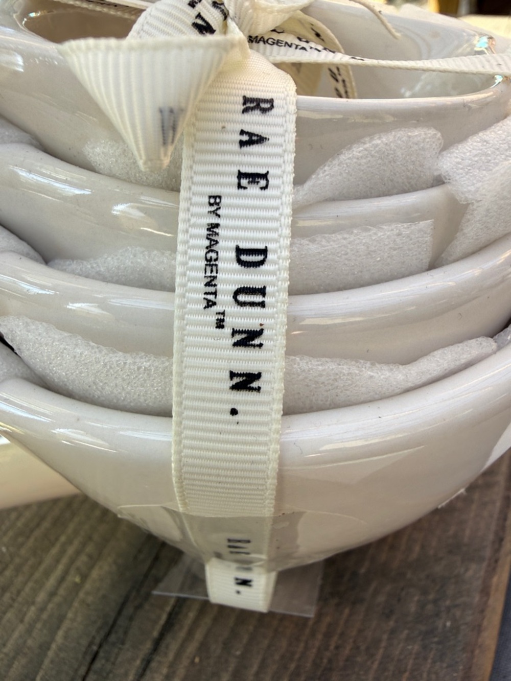 Rae Dunn White Stacked Ceramic measuring cups with Branded Ribbon